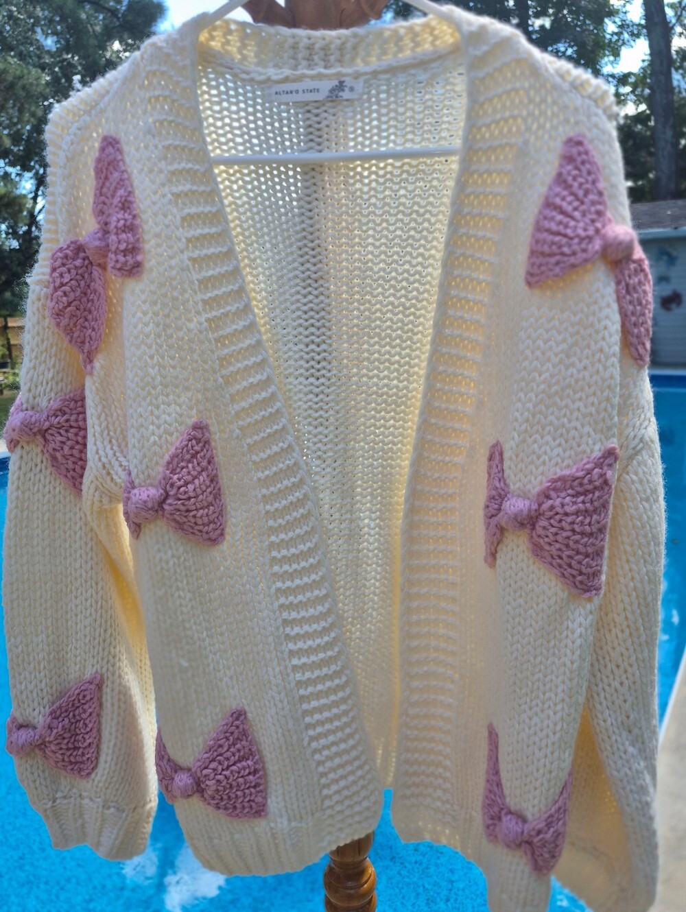 NWT's Altar'd State Cream open-front  Knit Cardigan with Pink Bow Accents